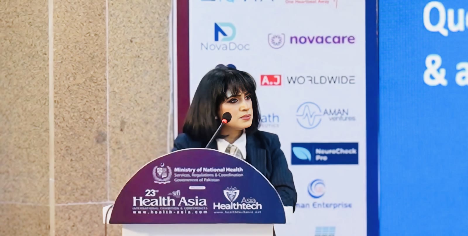 Tanha Tabassum speaking at the 23rd Health Asia podium